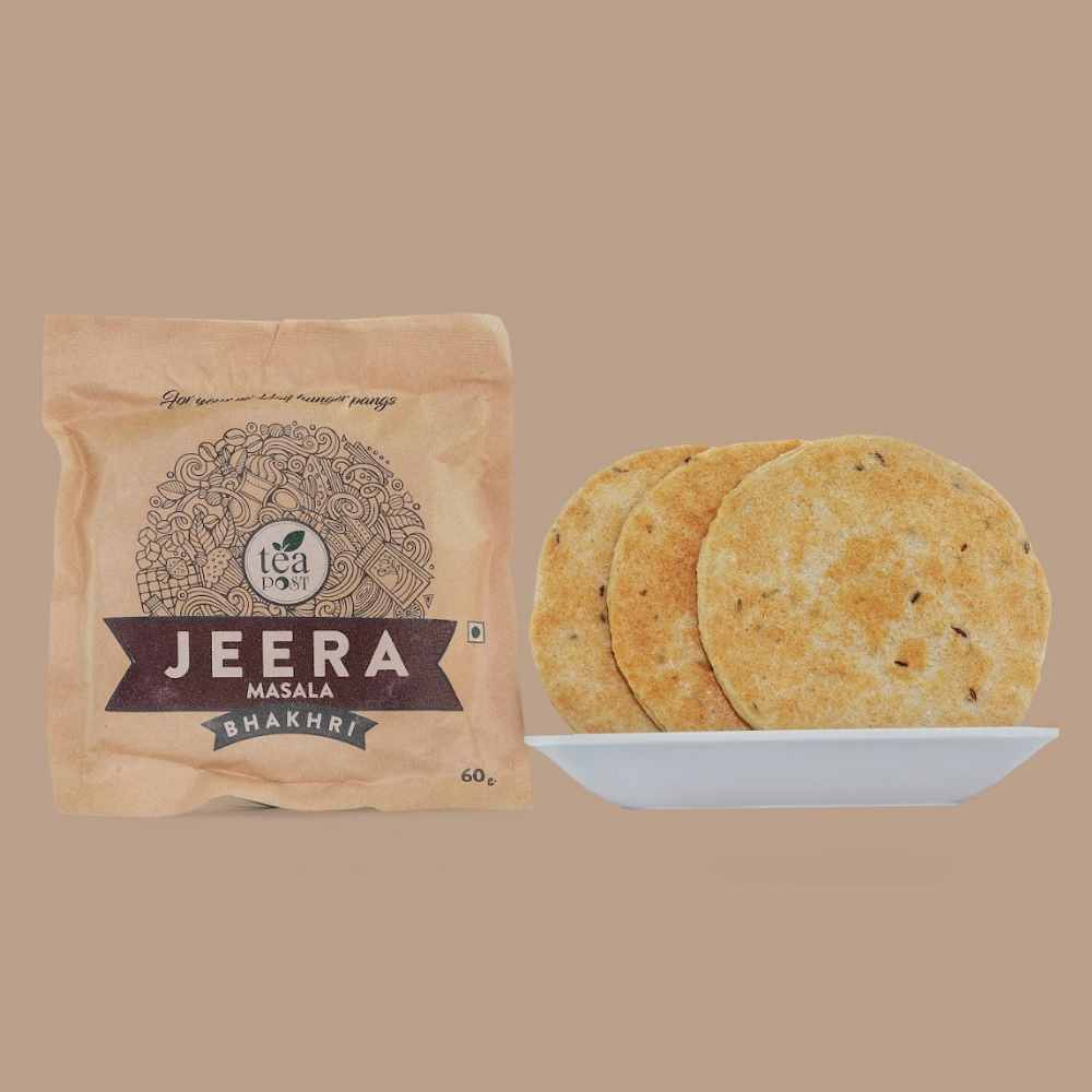 A Packet of Jeera Masala Bhakhri along with a plate of Jeera Masala Bhakhri
